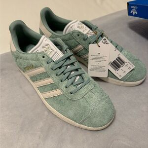 Teal suede Addidas Gazelle’s never worn, new with tags in original box.